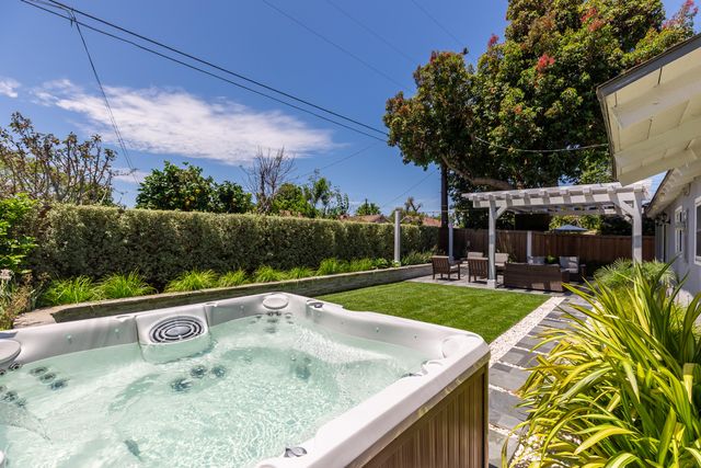 a view of a swimming pool with a patio