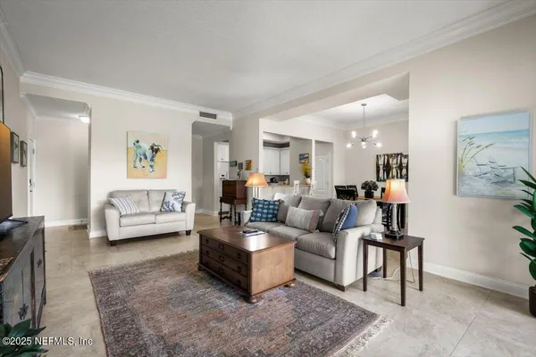 a living room with furniture and a couch