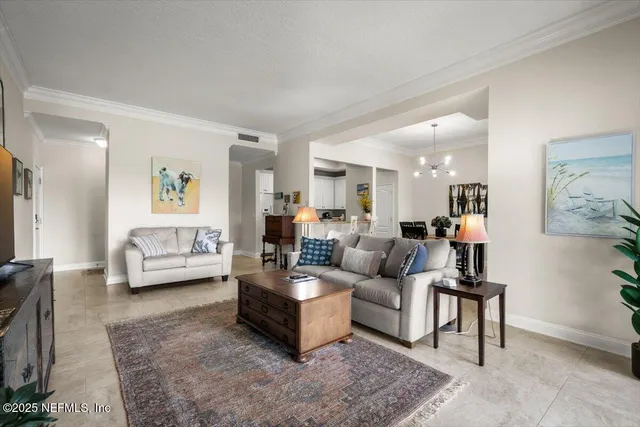 a living room with furniture and a couch