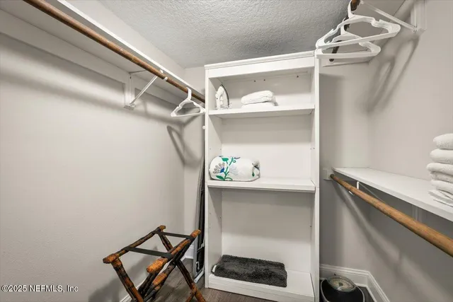 a view of a room with rack on the wall