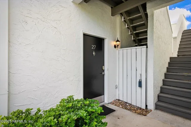a view of a house with a wooden door