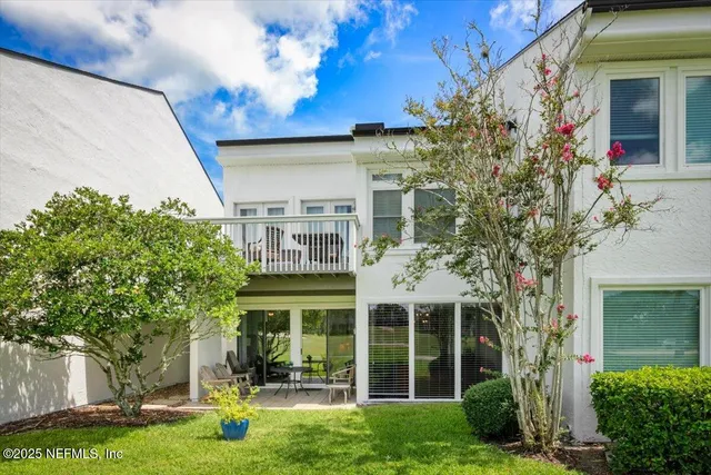 a view of a building with a garden