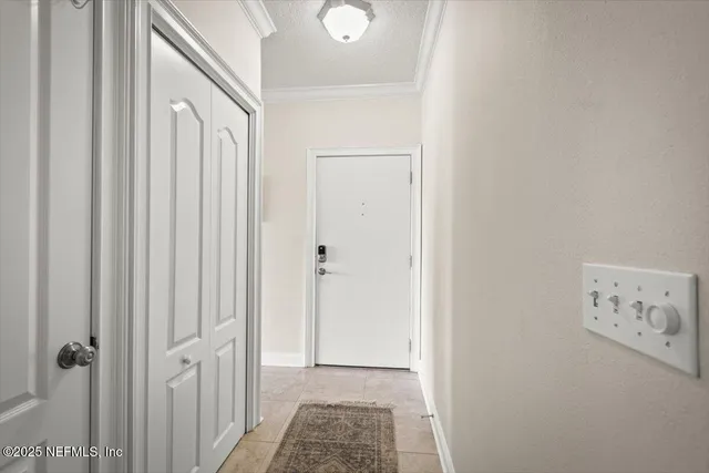 a view of a hallway with entryway