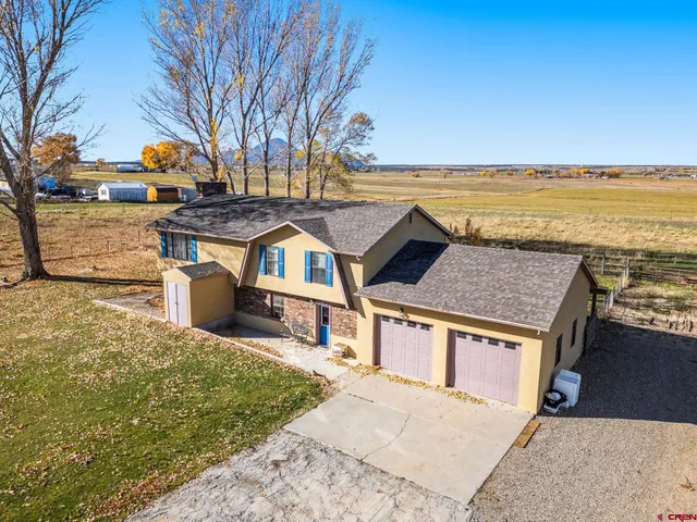 a front view of a house with a ocean view