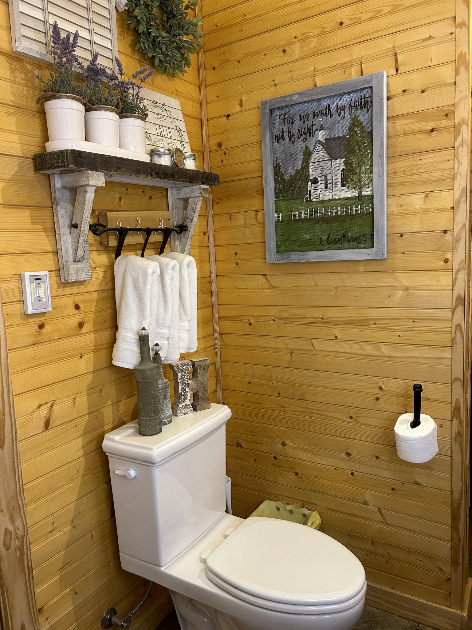 5013 Eva Road Camden, TN 38320 - Photo 26 of 37 a bathroom with a toilet and sink