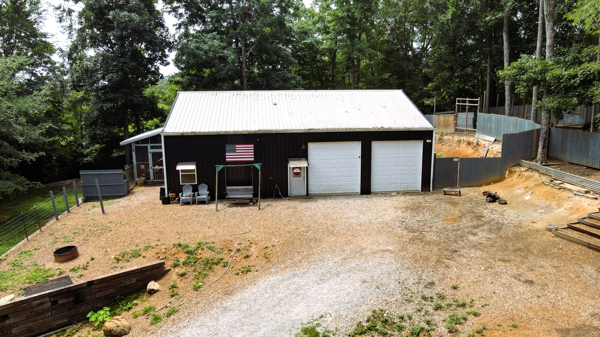 5013 Eva Road Camden, TN 38320 - Photo 29 of 37 a view of a house with a wooden fence