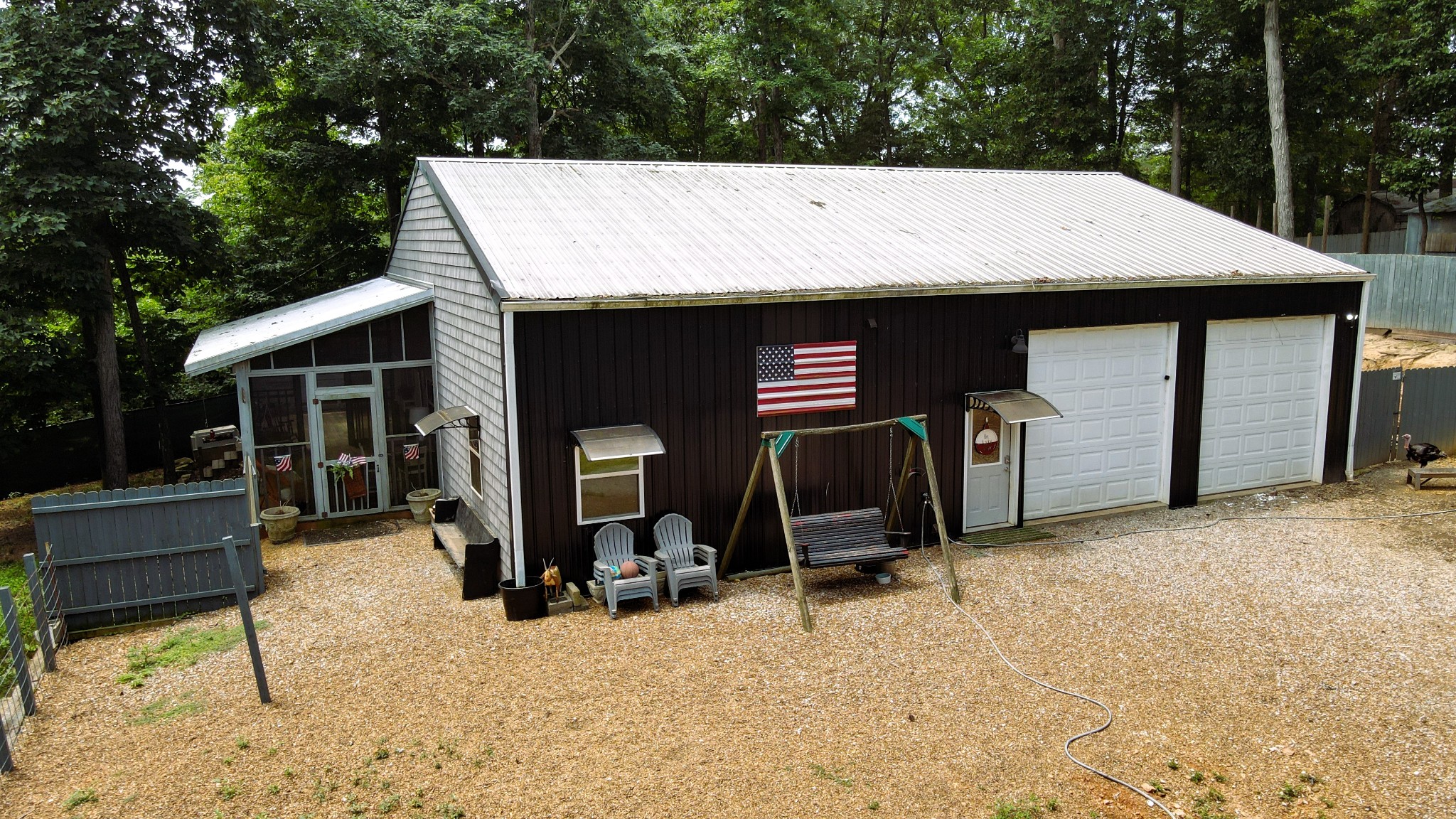 5013 Eva Road Camden, TN 38320 - Photo 34 of 37 a view of a patio with a table and chairs