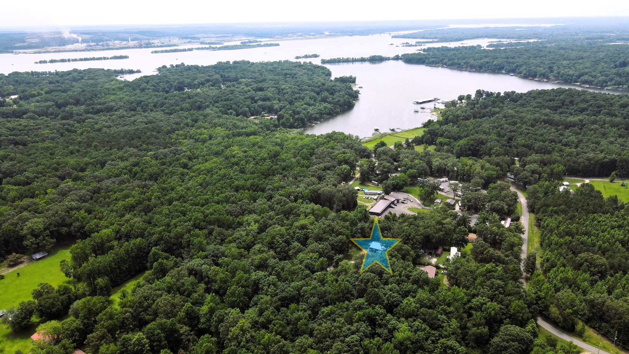 5013 Eva Road Camden, TN 38320 - Photo 36 of 37 a view of a city and a lake