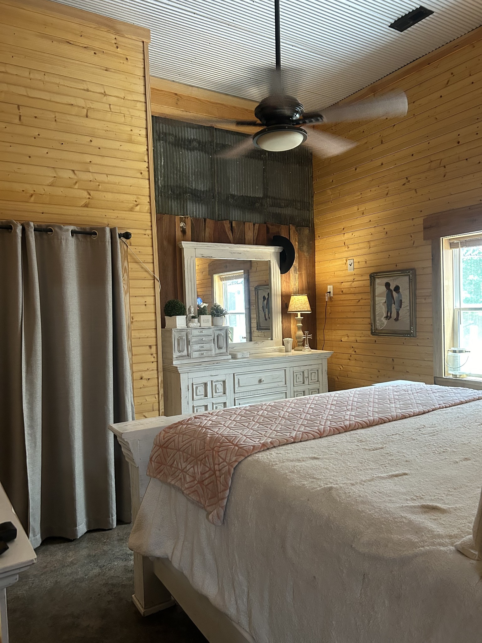 5013 Eva Road Camden, TN 38320 - Photo 8 of 37 a bedroom with a bed mirror and a window