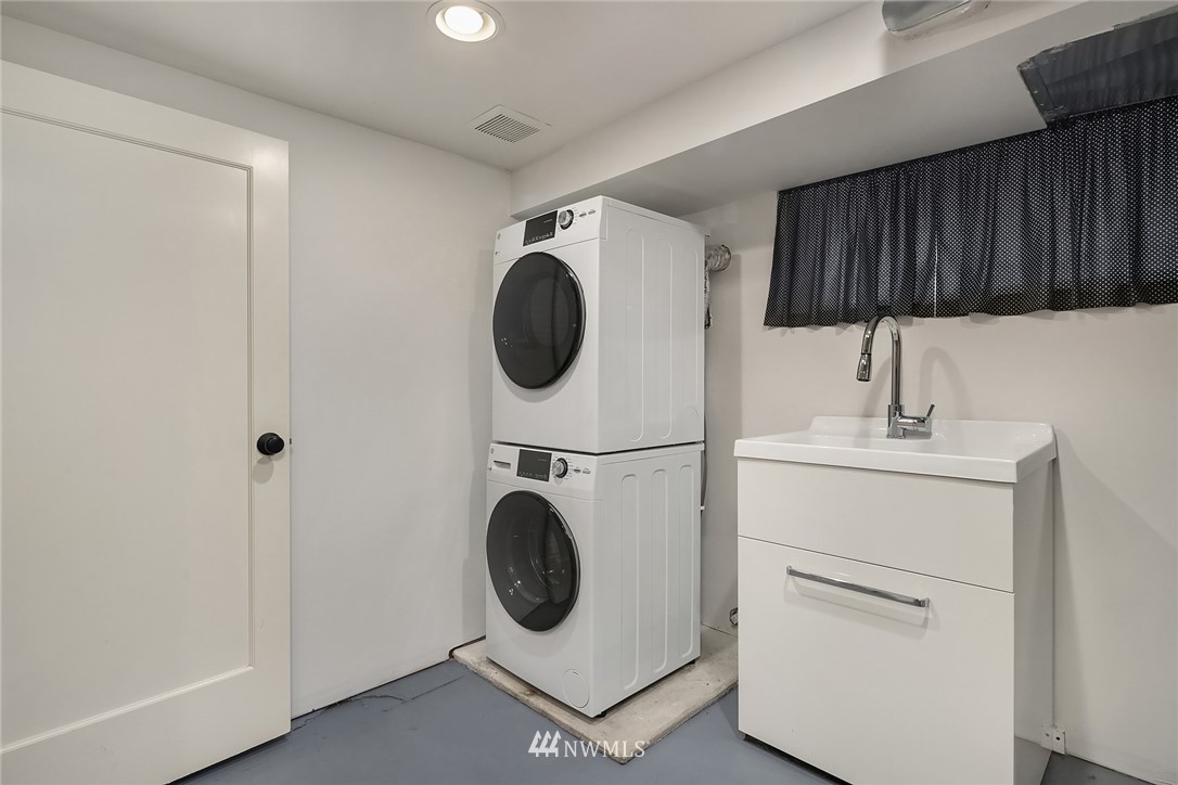 112 North 58th Street Seattle, WA 98103 - Photo 22 of 27 a utility room with dryer and washer