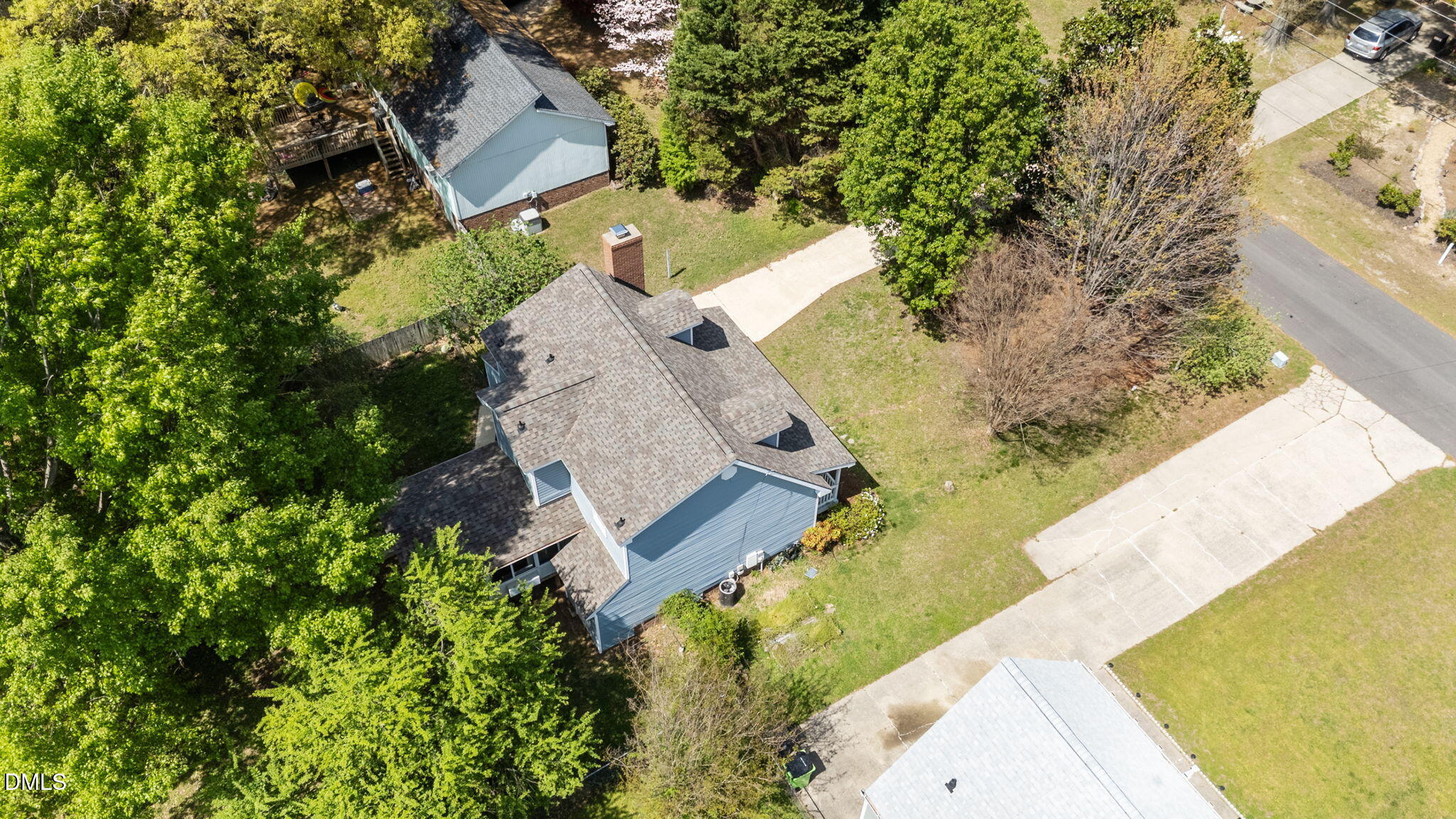 804 Olive Street Apex, NC 27502 - Photo 47 of 60 an aerial view of a house with a yard