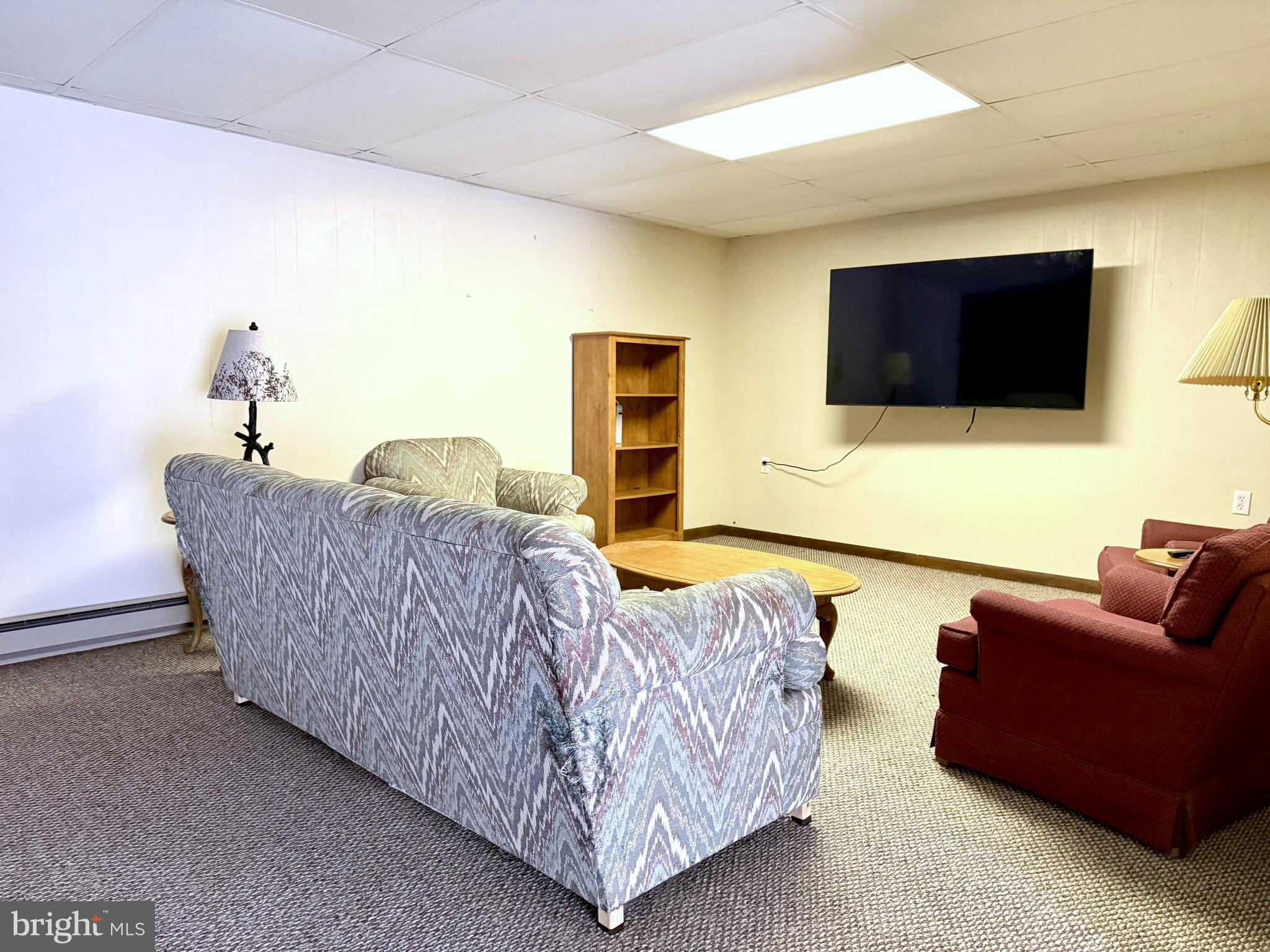 42 Linnet Drive Lock Haven, PA 17745 - Photo 20 of 40 a living room with furniture and a flat screen tv