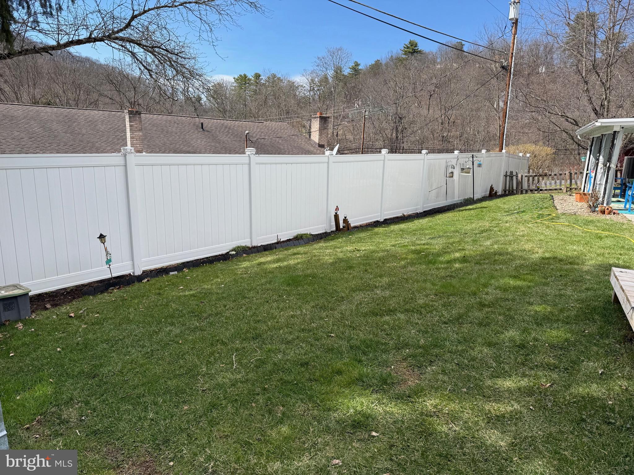 42 Linnet Drive Lock Haven, PA 17745 - Photo 32 of 40 a view of a backyard with white fence