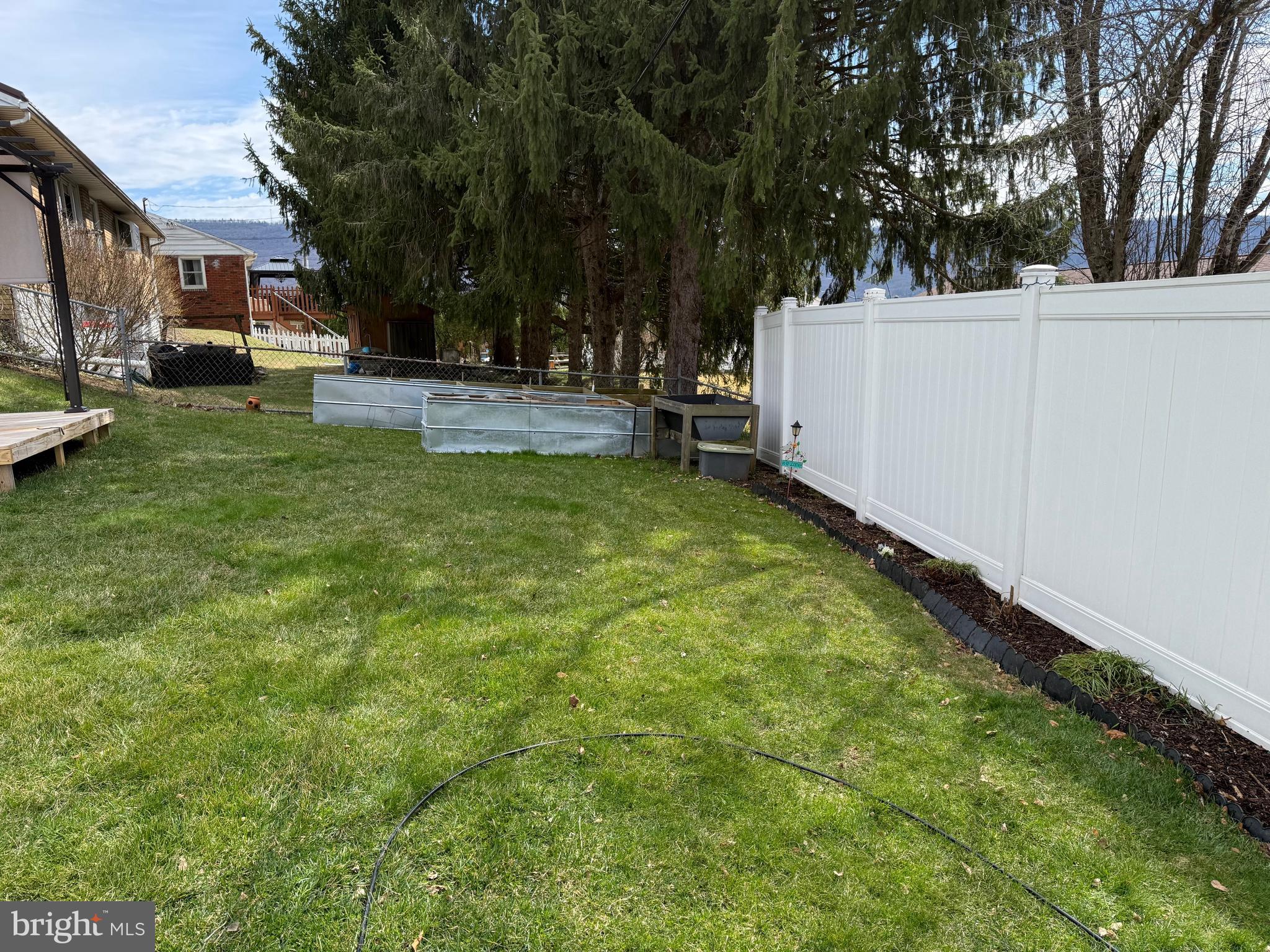 42 Linnet Drive Lock Haven, PA 17745 - Photo 33 of 40 a view of a yard with furniture and trees