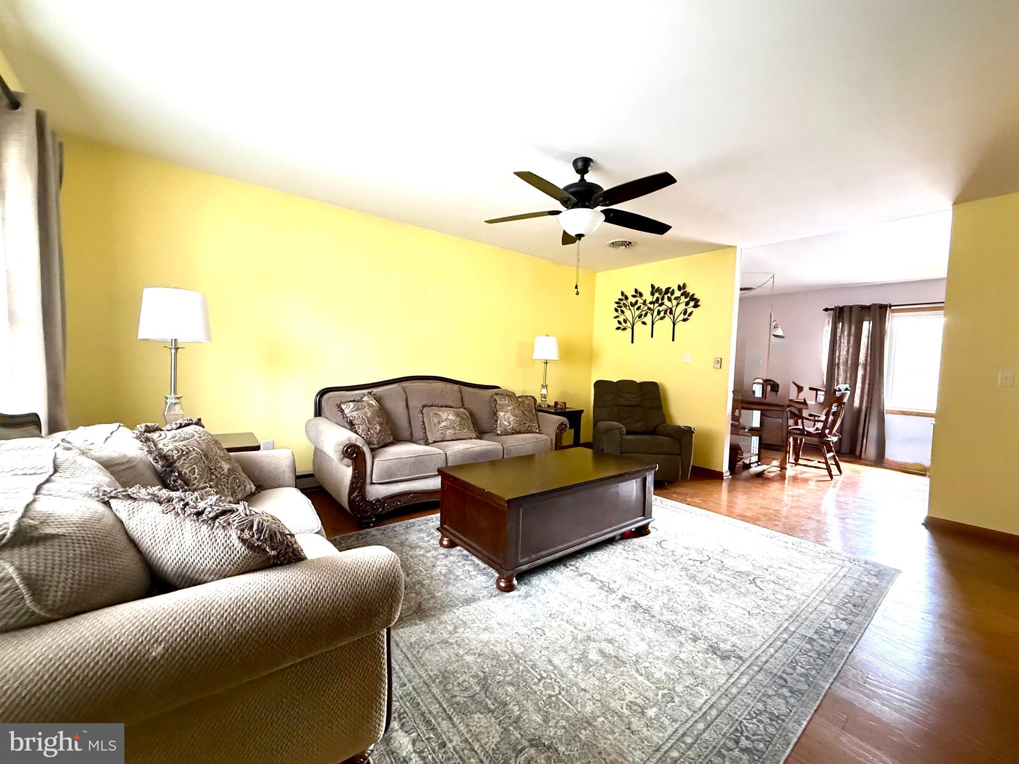42 Linnet Drive Lock Haven, PA 17745 - Photo 7 of 40 a living room with furniture and wooden floor