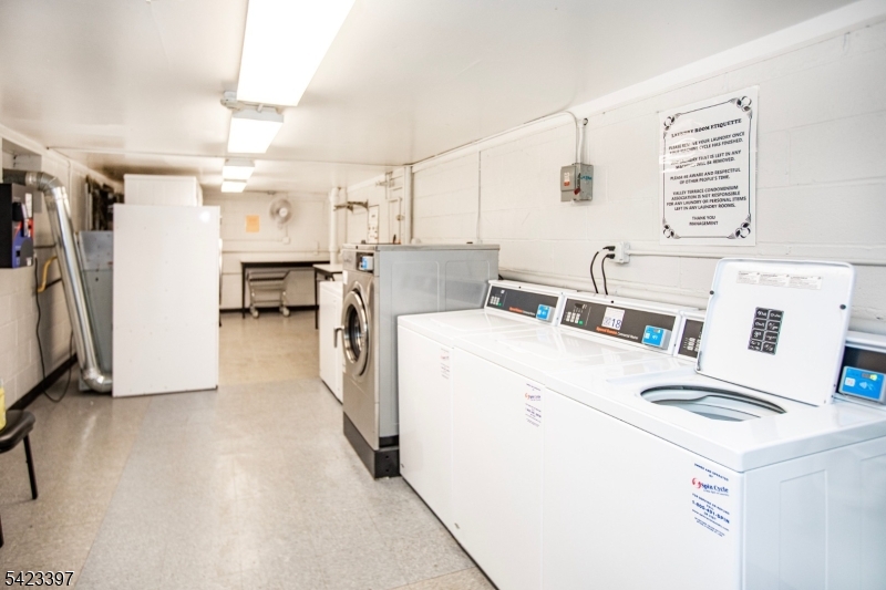 1130 Valley Road, Unit 2B Wayne, NJ 07470 - Photo 30 of 47 a utility room with dryer and washer