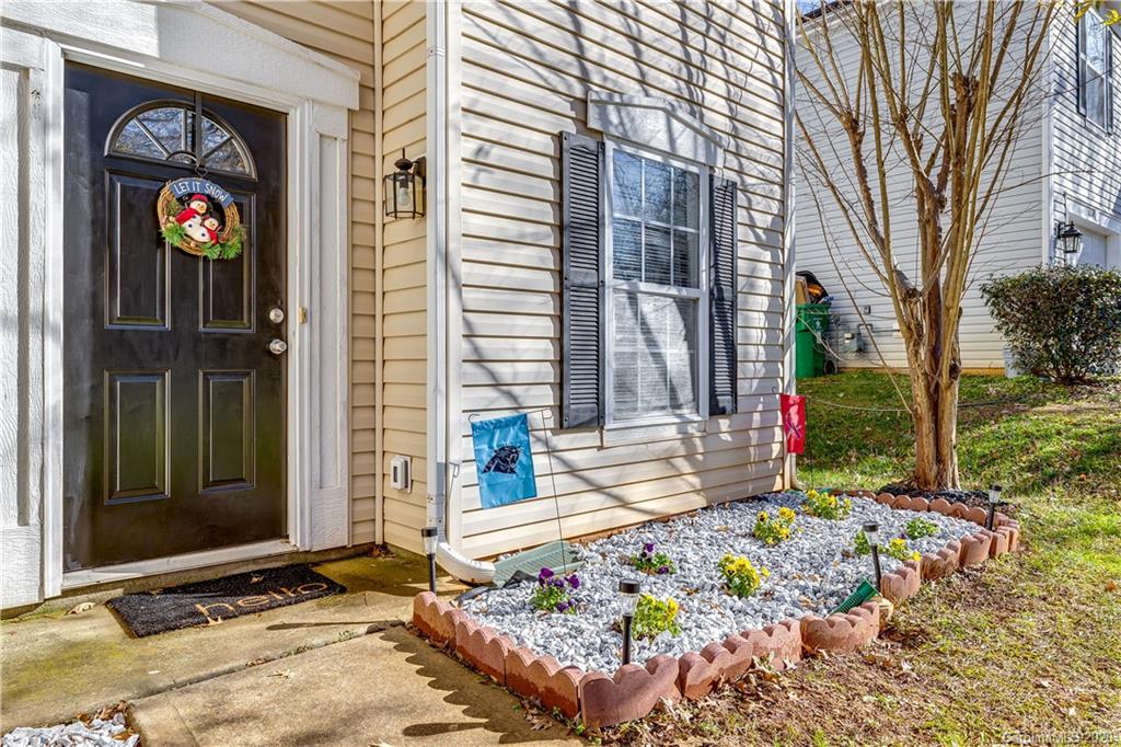 8808 Old Potters Road Charlotte, NC 28269 - Photo 2 of 34 a front view of a house