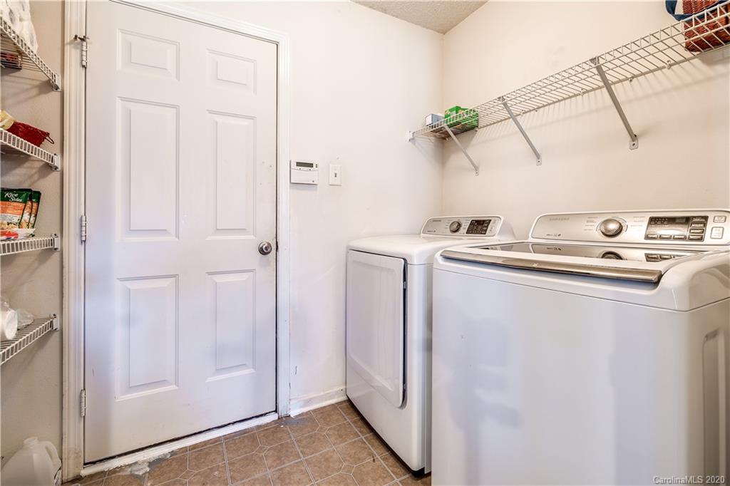 8808 Old Potters Road Charlotte, NC 28269 - Photo 16 of 34 a utility room with dryer and washer