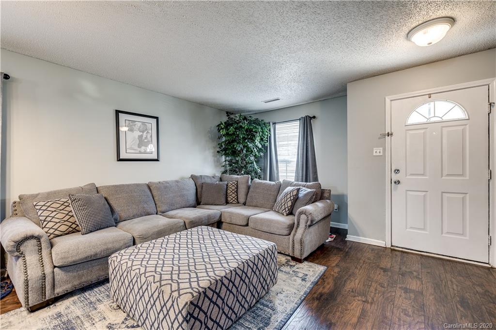 8808 Old Potters Road Charlotte, NC 28269 - Photo 3 of 34 a living room with furniture and a couch