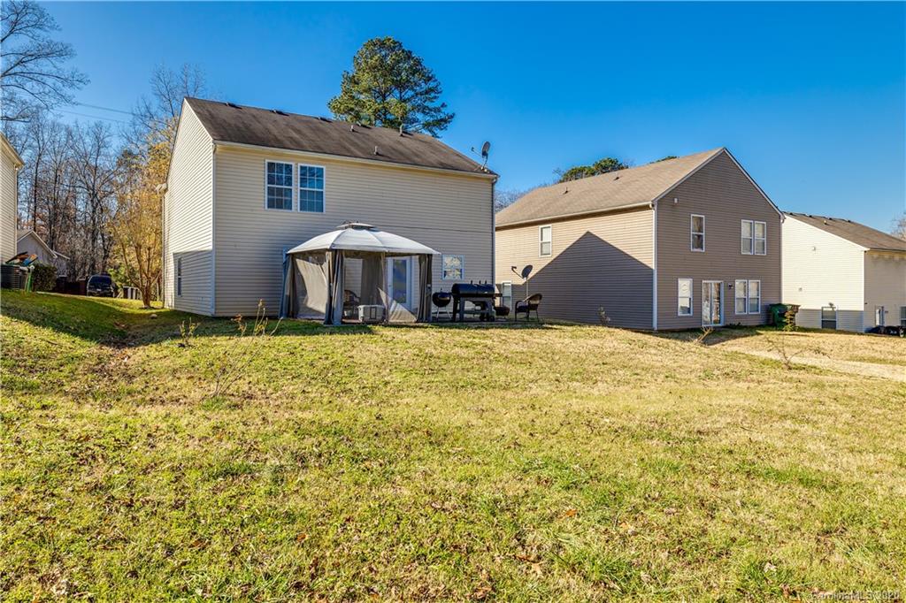 8808 Old Potters Road Charlotte, NC 28269 - Photo 33 of 34 a front view of house with yard