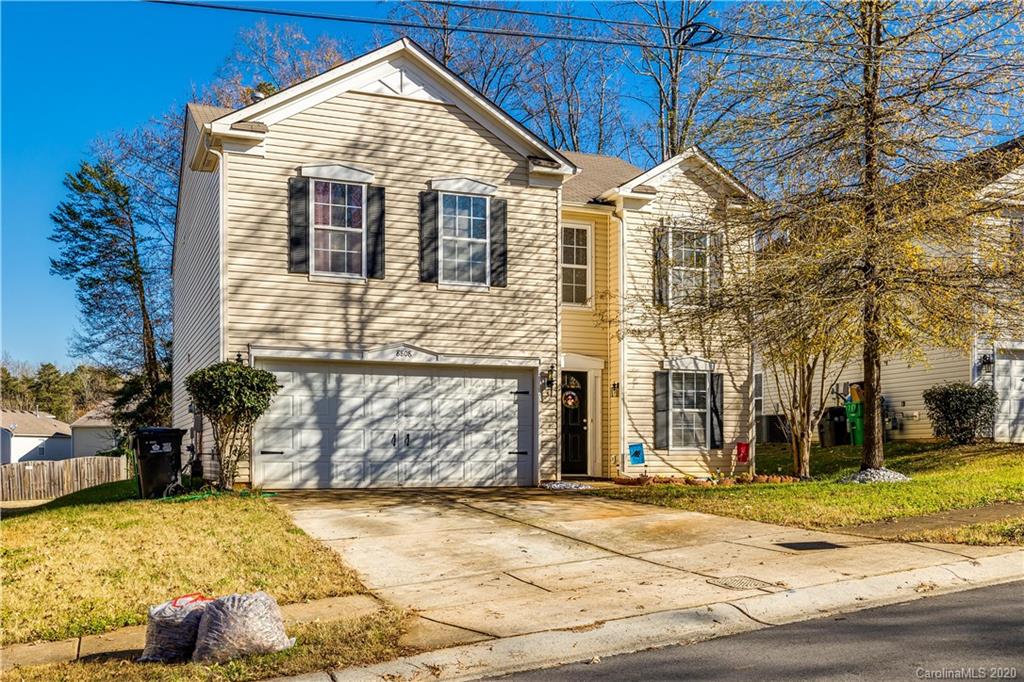 8808 Old Potters Road Charlotte, NC 28269 - Photo 34 of 34 a view of a house with a yard