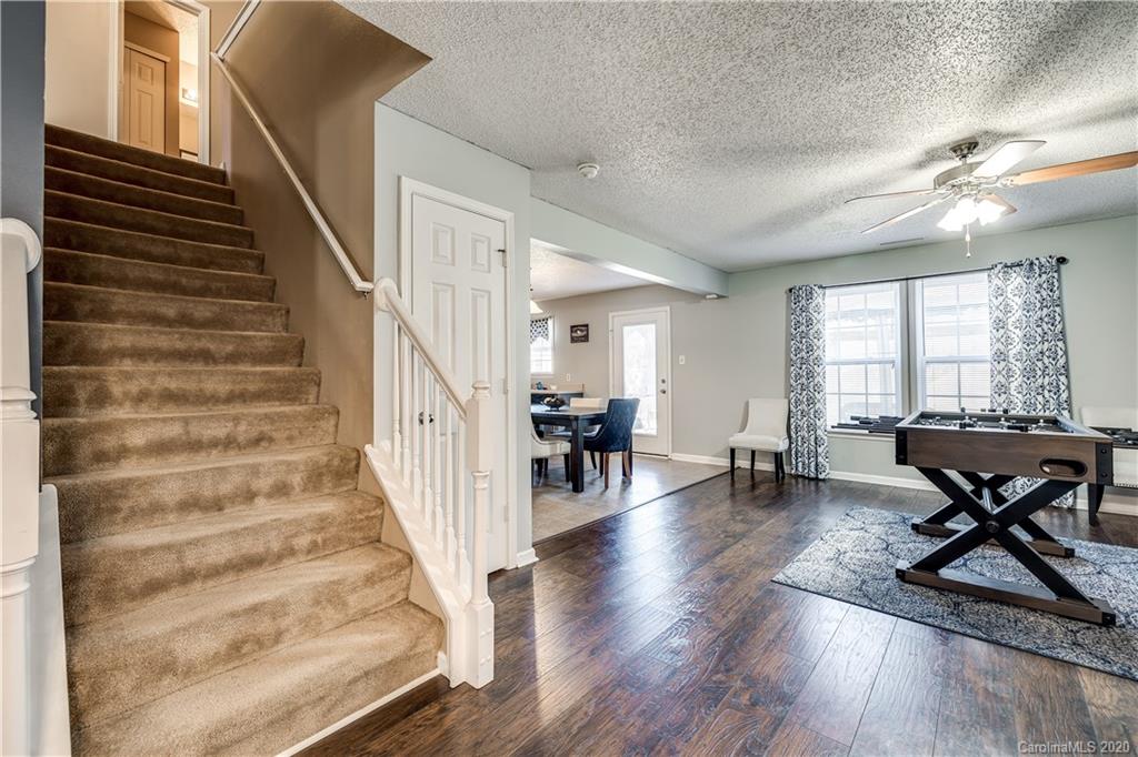 8808 Old Potters Road Charlotte, NC 28269 - Photo 6 of 34 a view of entryway and hall with wooden floor