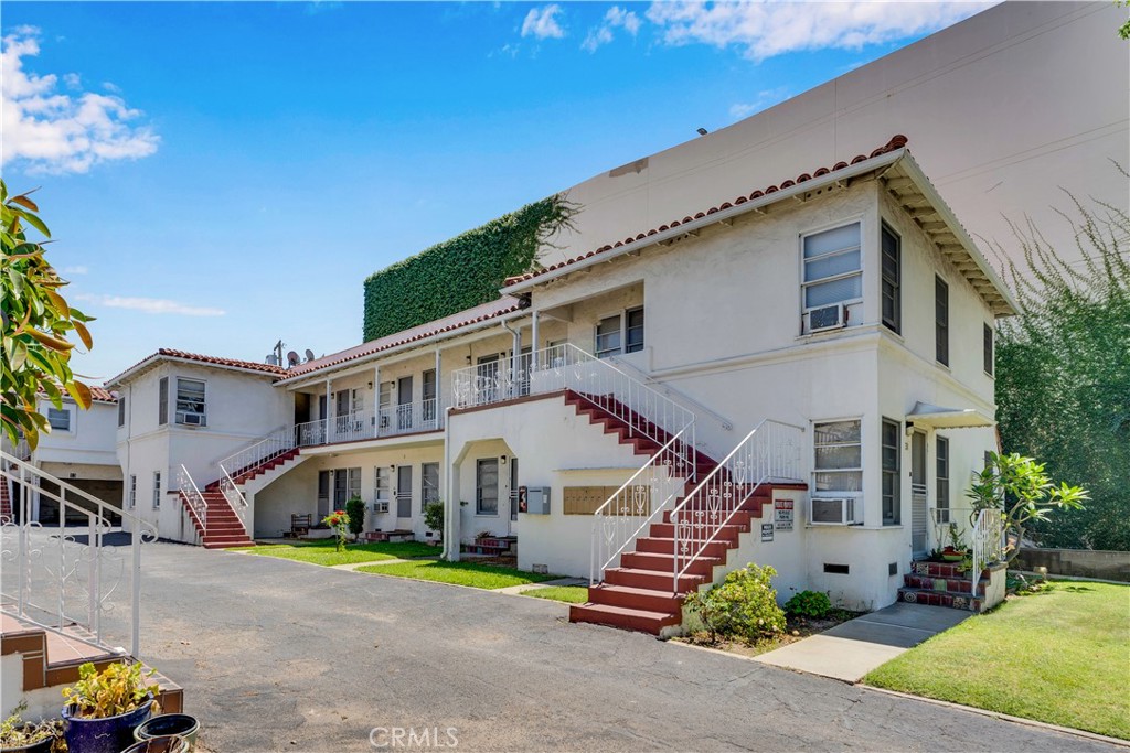 34 North 1st Street, Unit 7 Alhambra, CA 91801 - Photo 1 of 7 a front view of house with a yard