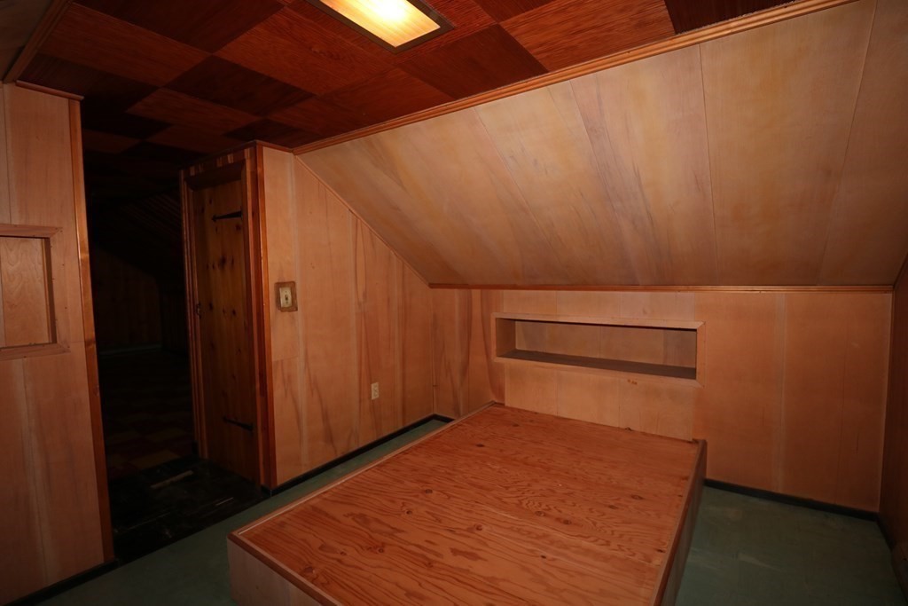 118 Merrimac Avenue Springfield, MA 01104 - Photo 12 of 20 a view of a room with wooden walls