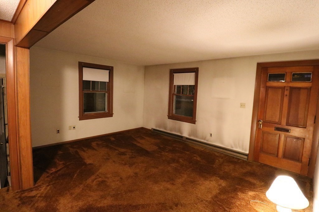 118 Merrimac Avenue Springfield, MA 01104 - Photo 5 of 20 an empty room with windows