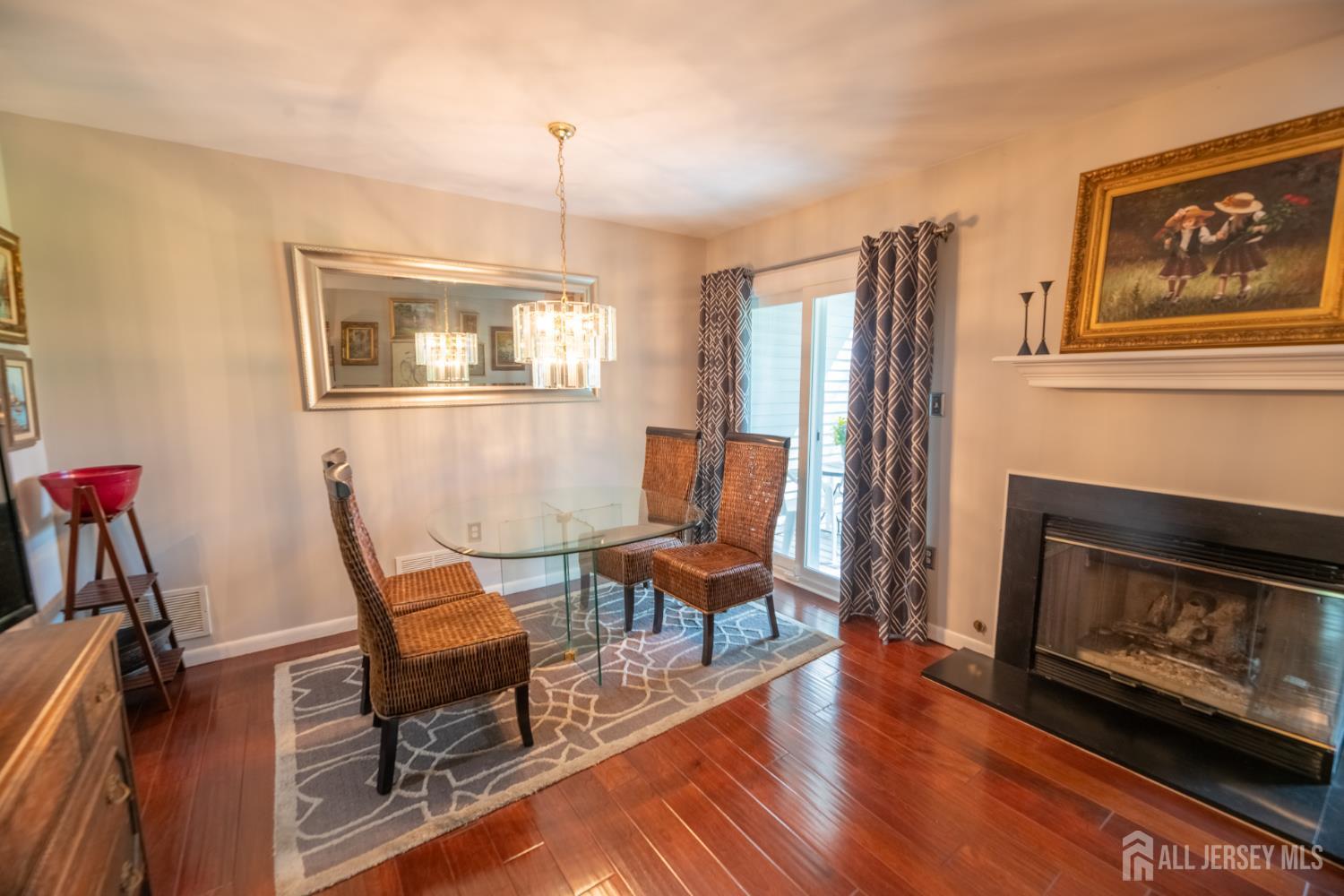 13 Mine Road Jamesburg, NJ 08831 - Photo 12 of 52 a living room with furniture and a fireplace