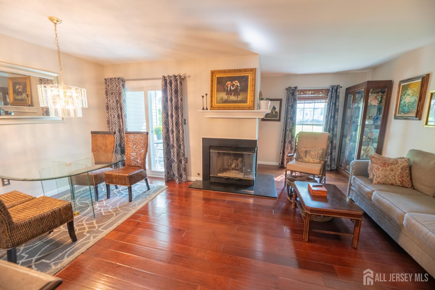 13 Mine Road Jamesburg, NJ 08831 - Photo 13 of 52 a living room with furniture and a fireplace