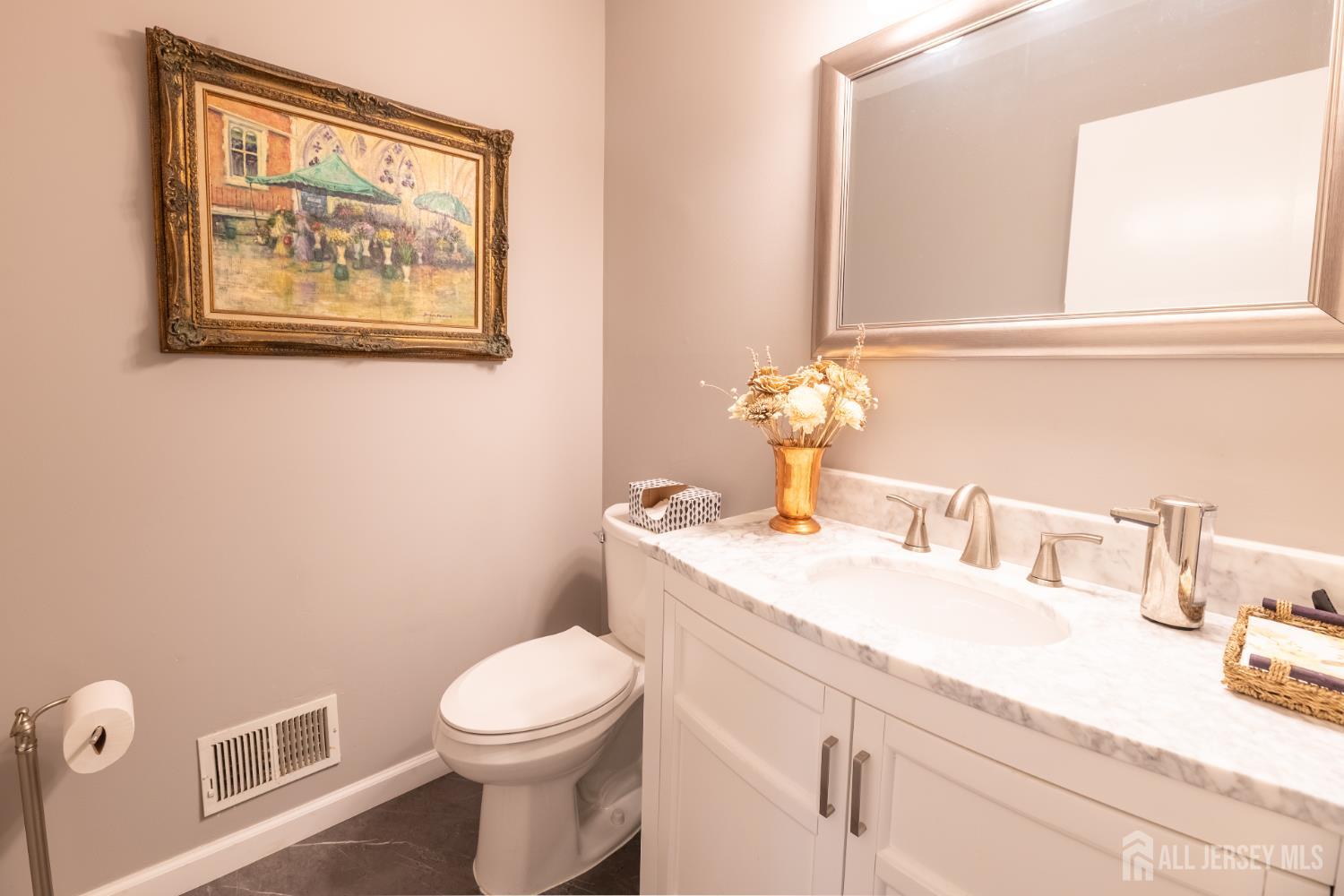 13 Mine Road Jamesburg, NJ 08831 - Photo 24 of 52 a bathroom with a toilet a sink and mirror