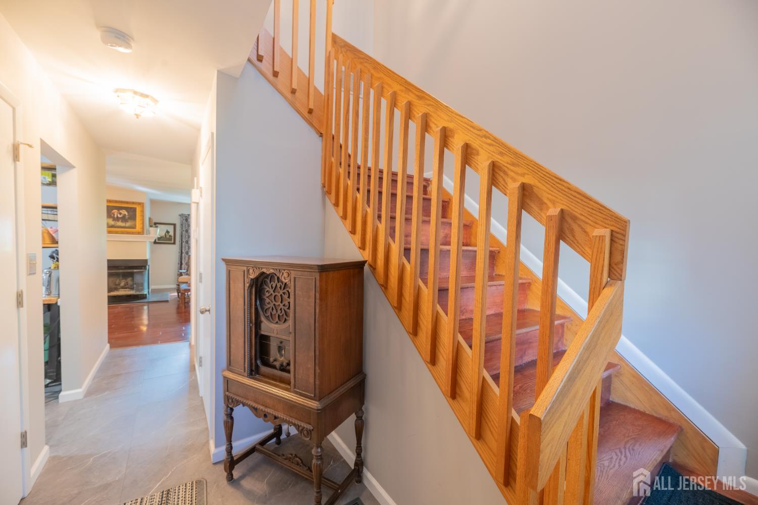 13 Mine Road Jamesburg, NJ 08831 - Photo 5 of 52 a view of entryway with stairs and wooden floor