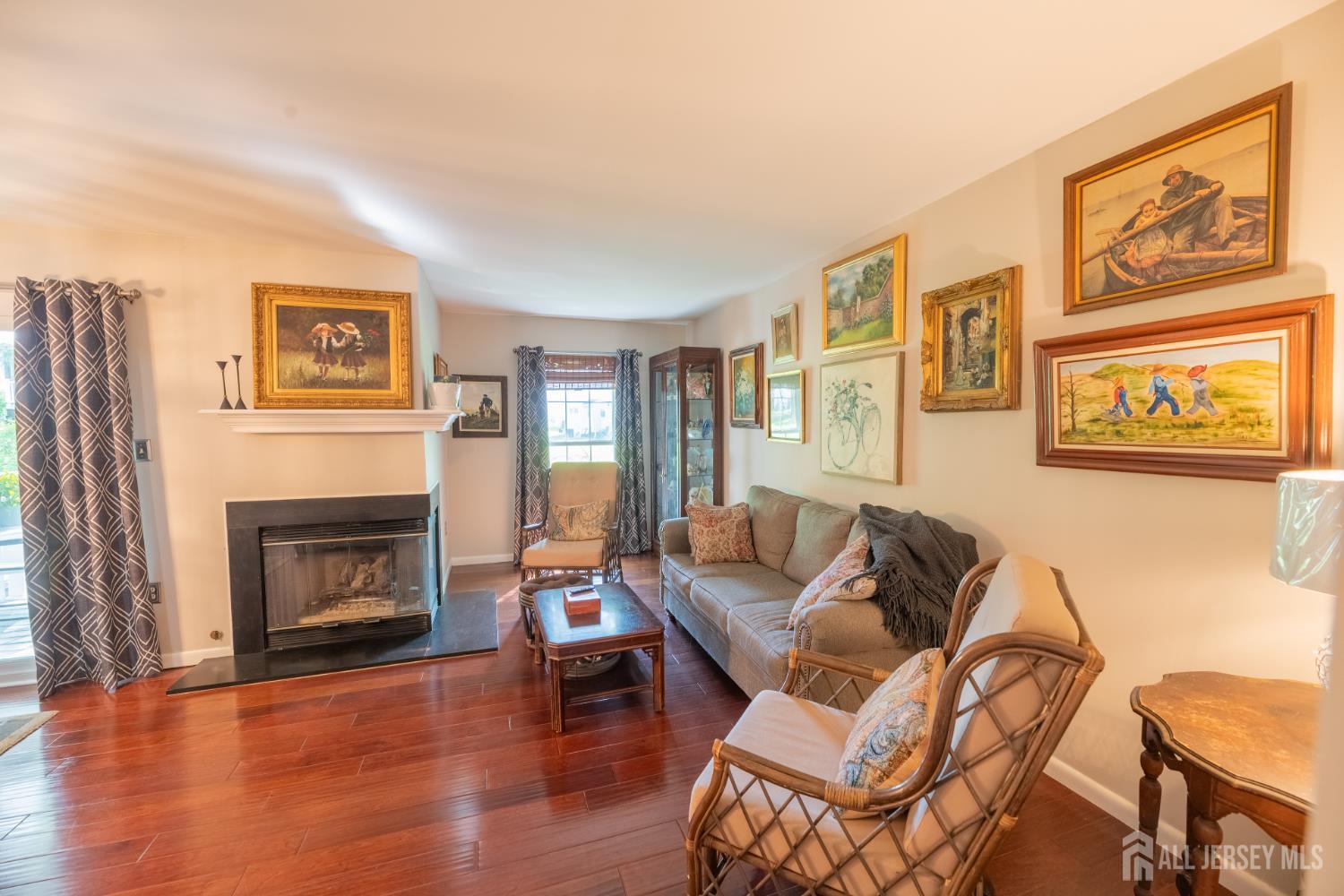 13 Mine Road Jamesburg, NJ 08831 - Photo 7 of 52 a living room with furniture and a fireplace