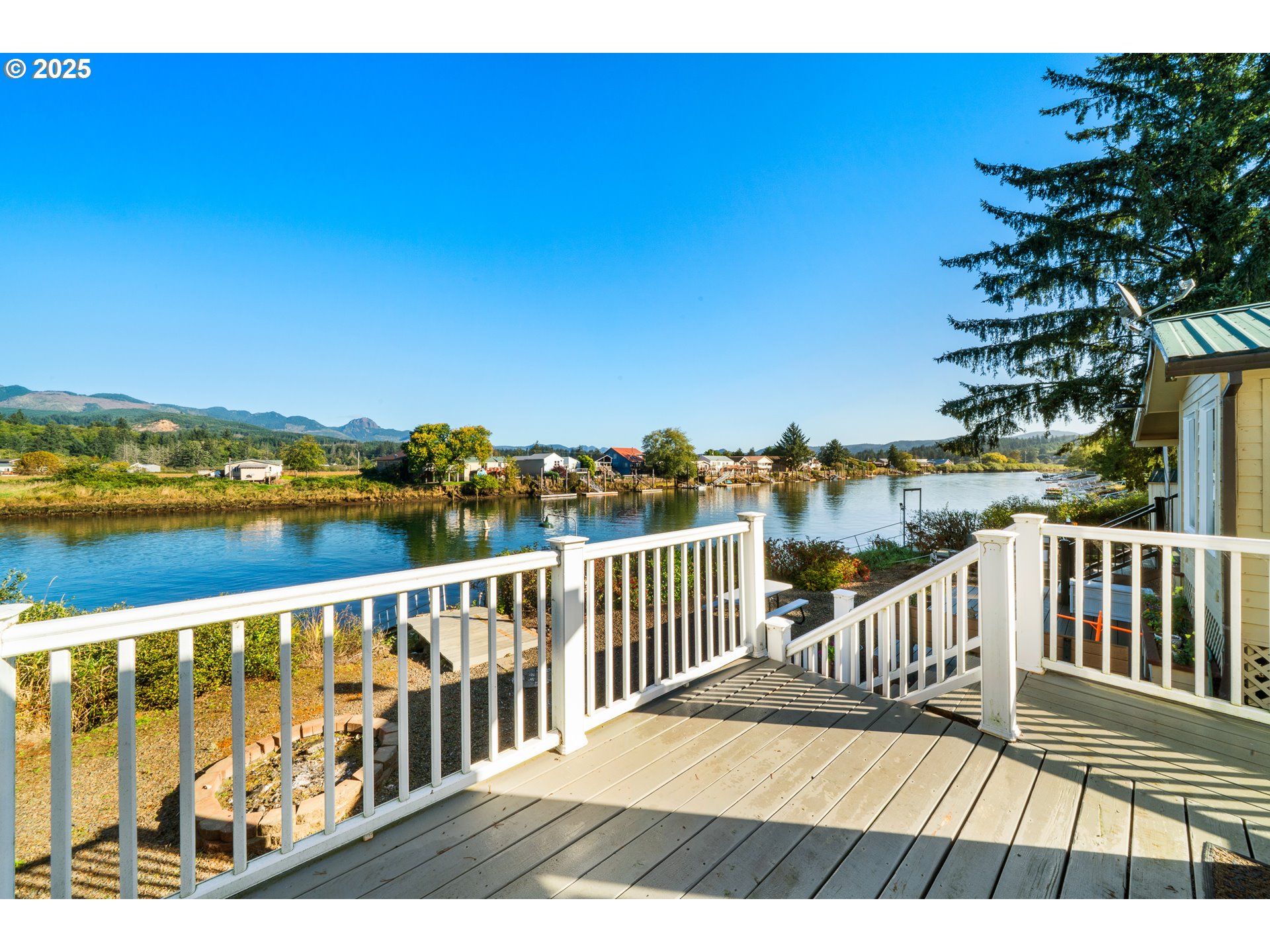 37000 Tohl Ranch Road, Unit 29 Nehalem, OR 97131 - Photo 23 of 46 a view of city from a balcony