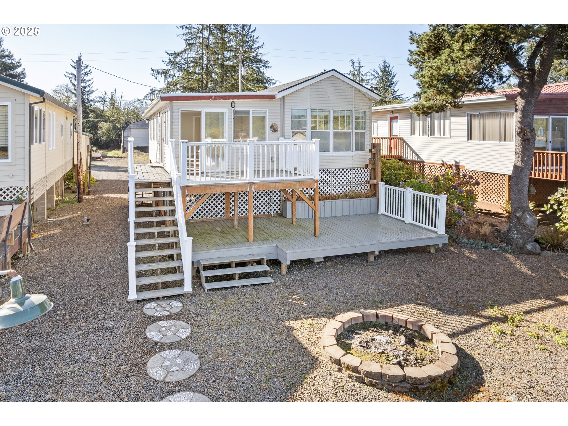 37000 Tohl Ranch Road, Unit 29 Nehalem, OR 97131 - Photo 28 of 46 a front view of a house with a yard