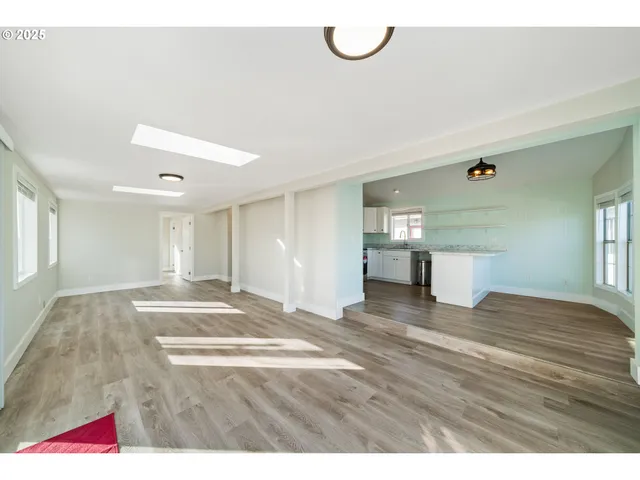 a view of an empty room and window