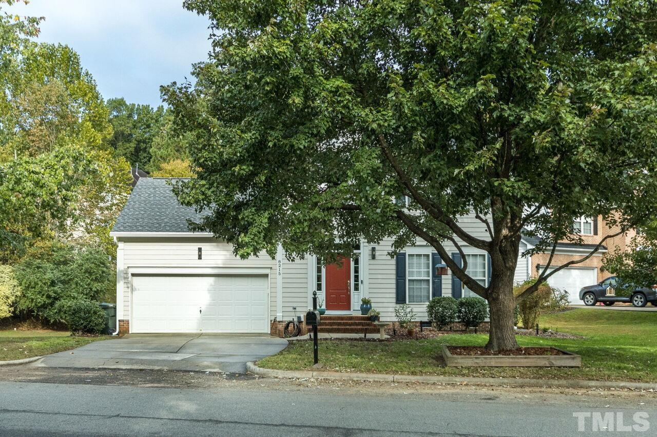 8215 Oneal Road Raleigh, NC 27613 - Photo 2 of 23 a front view of a house with a yard