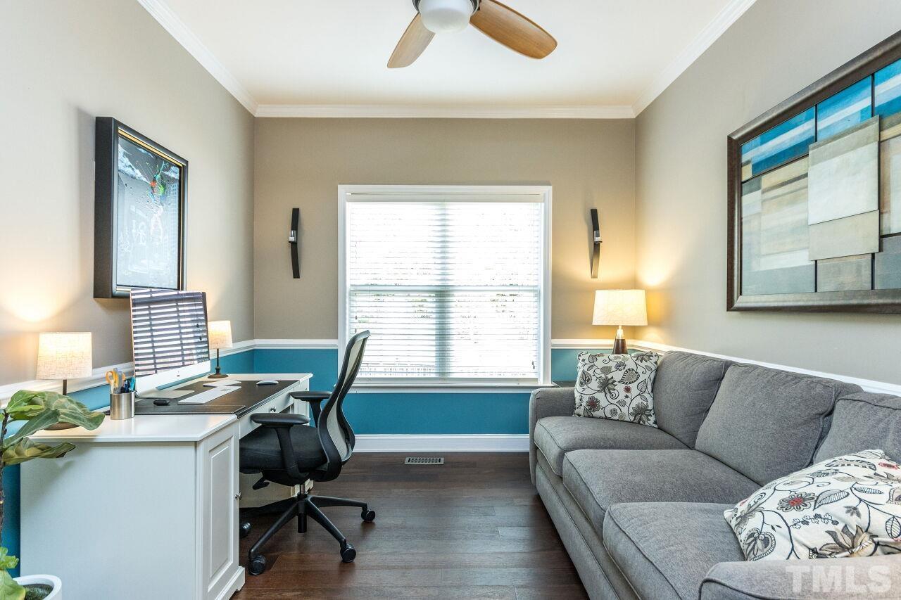 8215 Oneal Road Raleigh, NC 27613 - Photo 7 of 23 a living room with furniture and a window