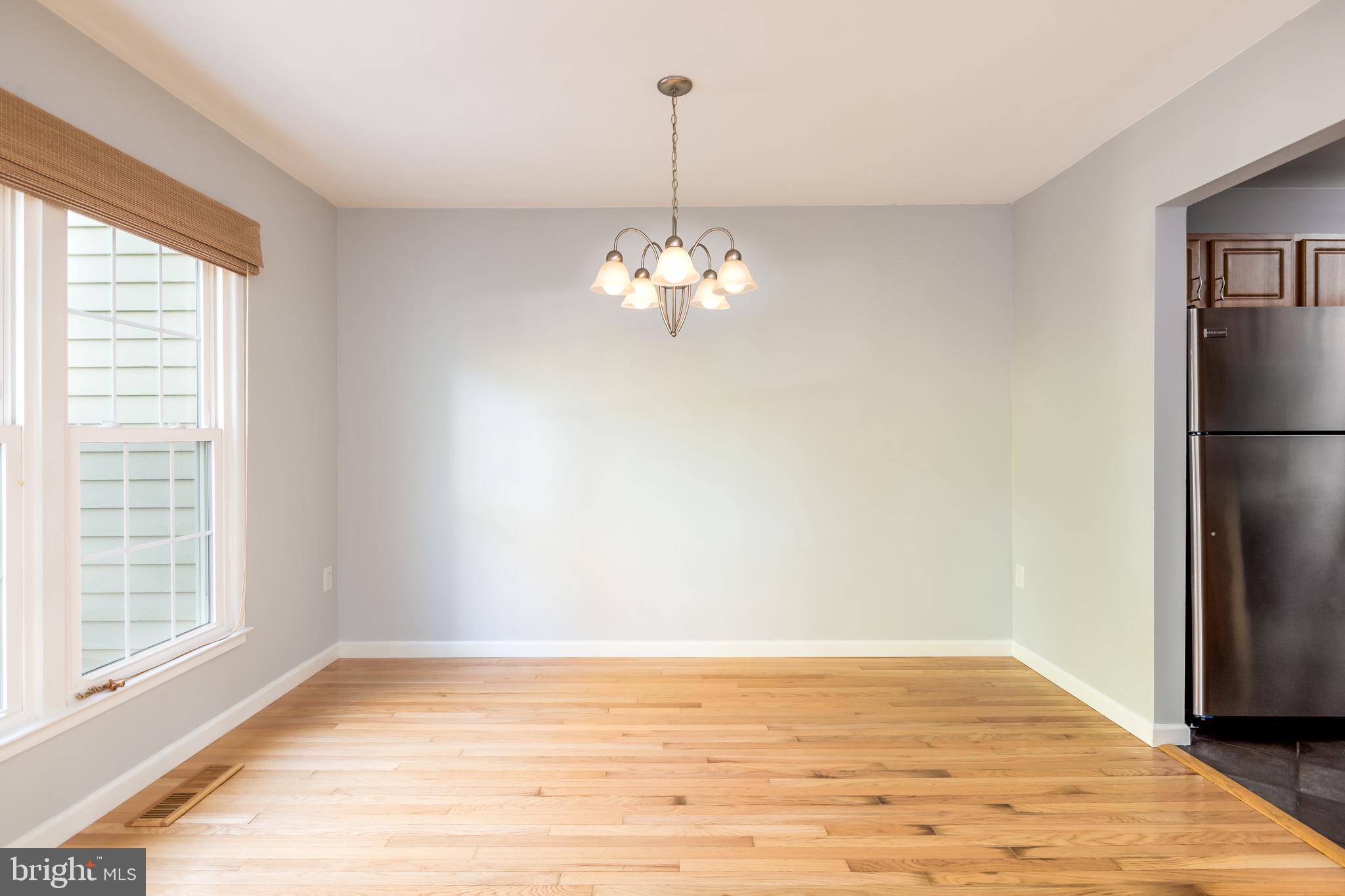 1762 Lang Drive Crofton, MD 21114 - Photo 13 of 32 Dining room- hardwoods , newly painted