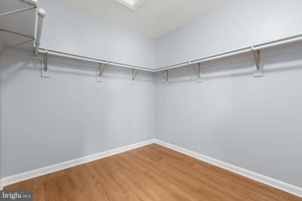 a view of a room with racks on the wall