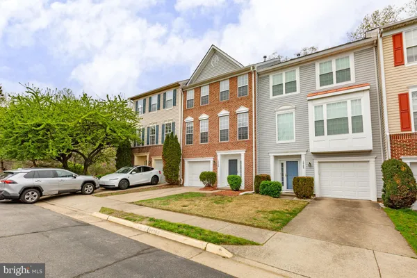 a view of a parked cars in front of a building