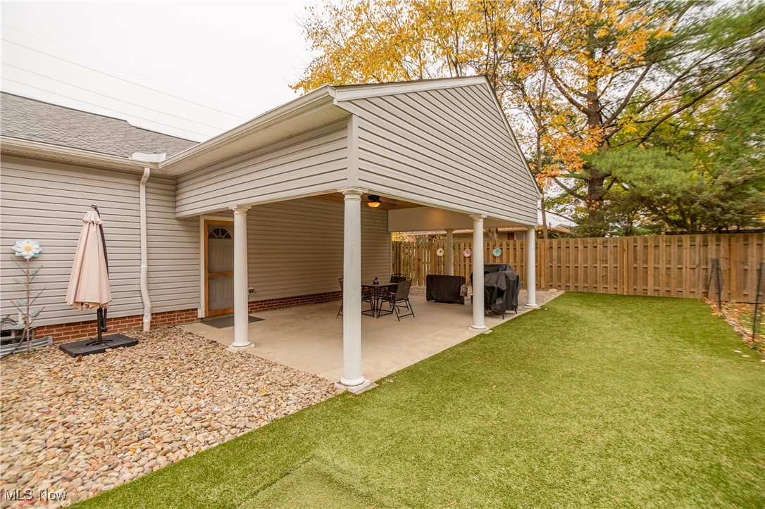 Backyard featuring a Covered Patio