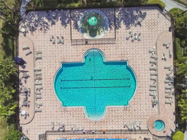 an aerial view of a house with a lake view