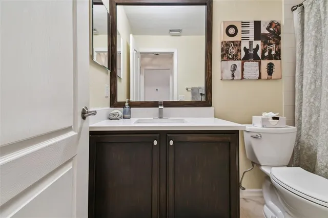 a bathroom with a sink and a toilet