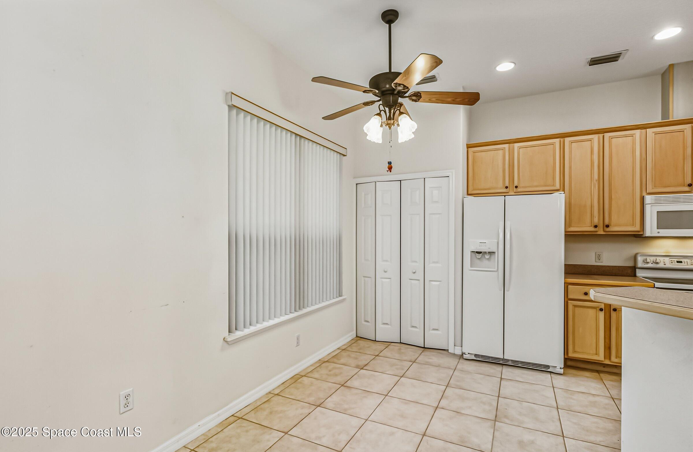 216 3rd Avenue Indialantic, FL 32903 - Photo 11 of 37 a view of a kitchen with a sink and cabinet area