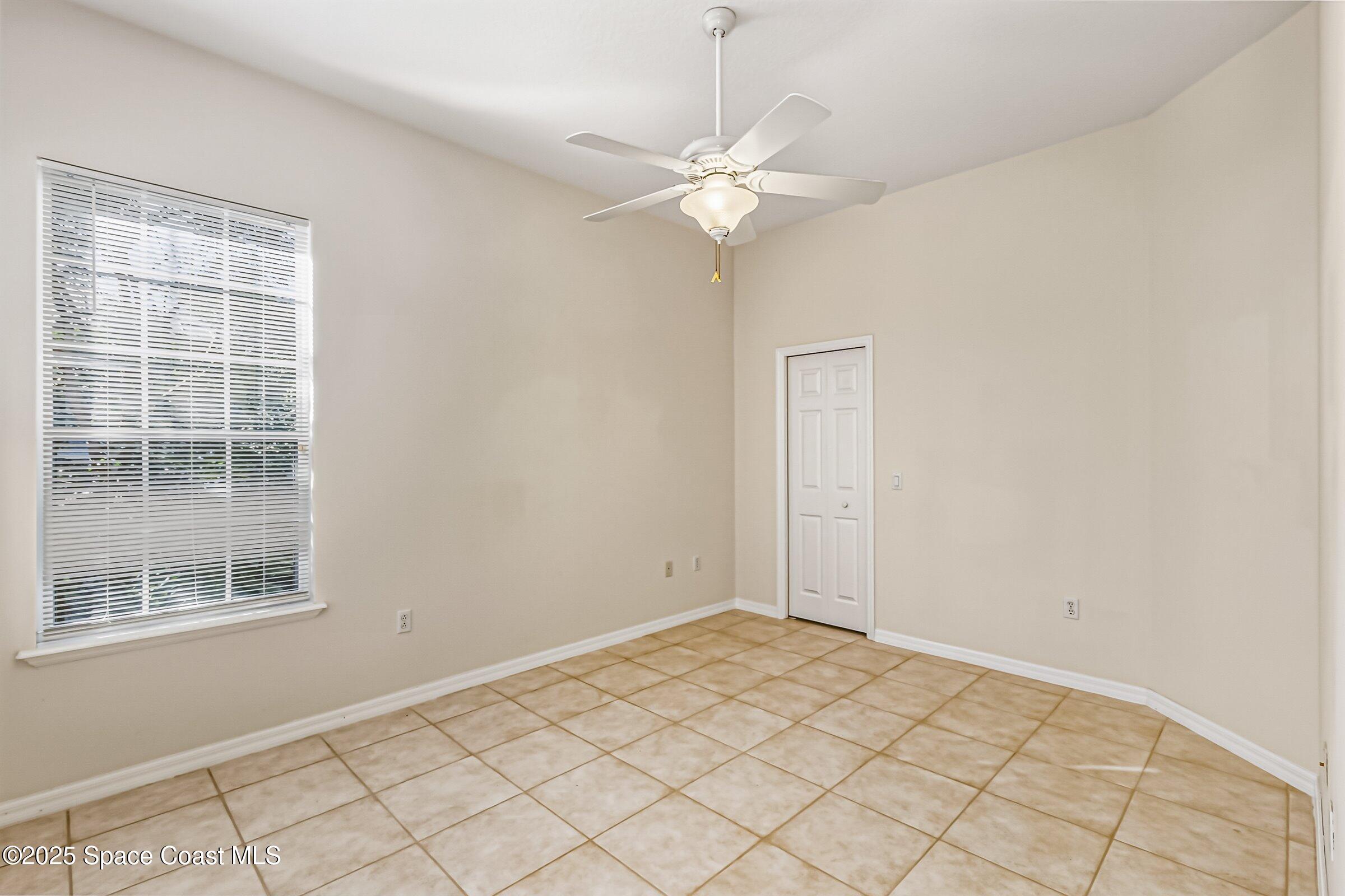 216 3rd Avenue Indialantic, FL 32903 - Photo 23 of 37 a view of an empty room with a window