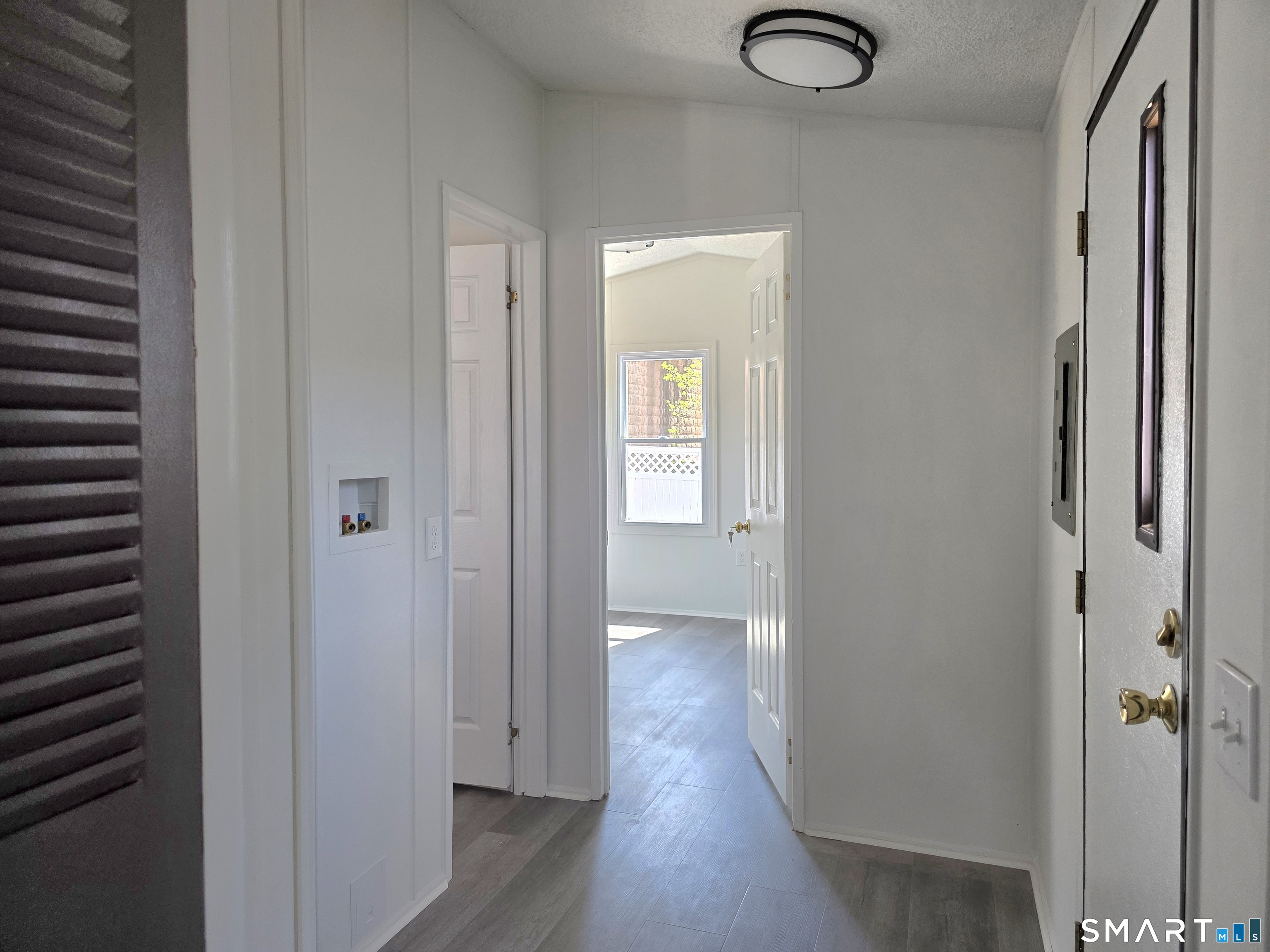 500 Washington Street, Unit 5 Middletown, CT 06457 - Photo 11 of 19 a view of hallway with wooden floor