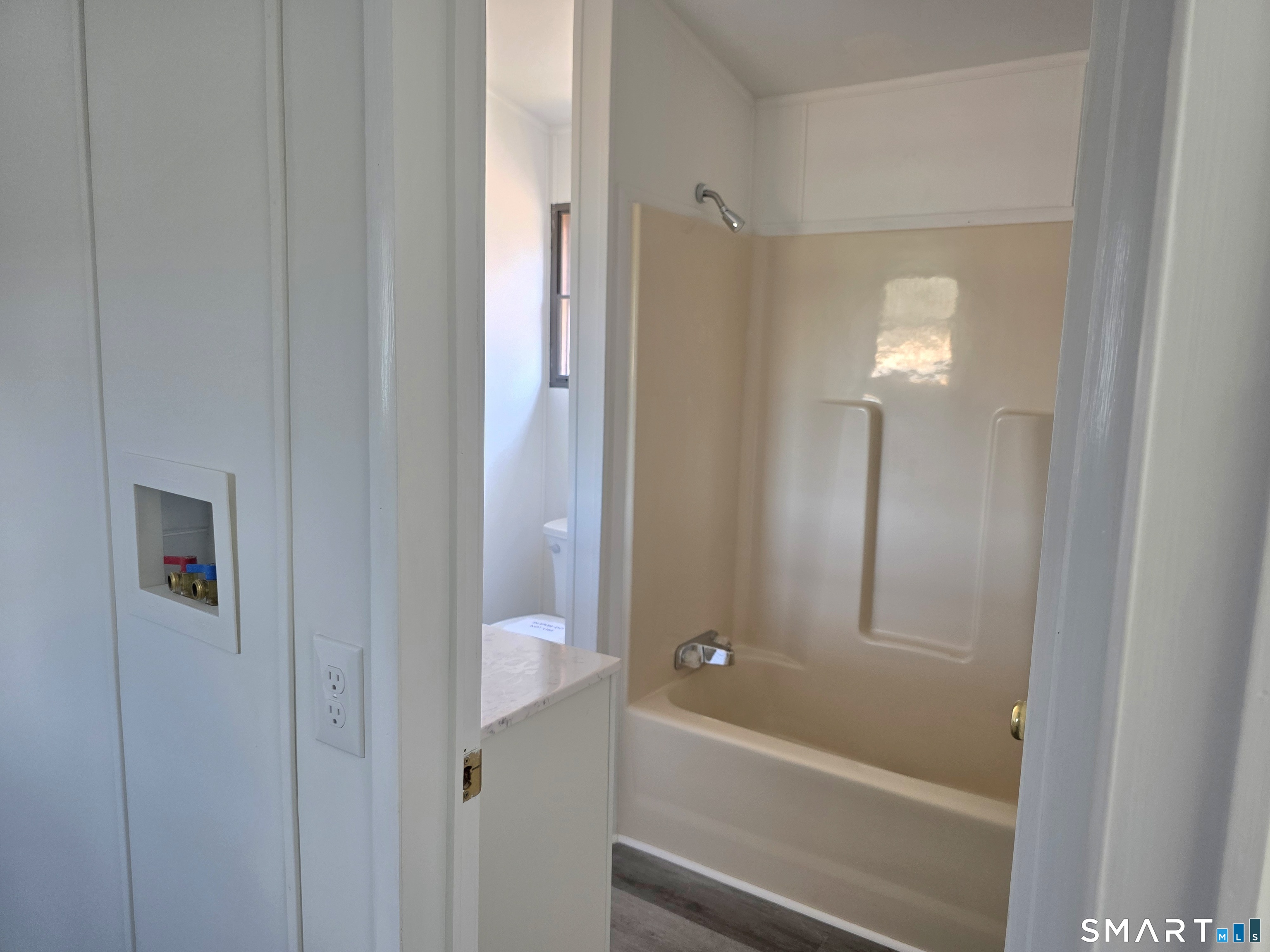 500 Washington Street, Unit 5 Middletown, CT 06457 - Photo 9 of 19 a bathroom with a bathtub and a shower
