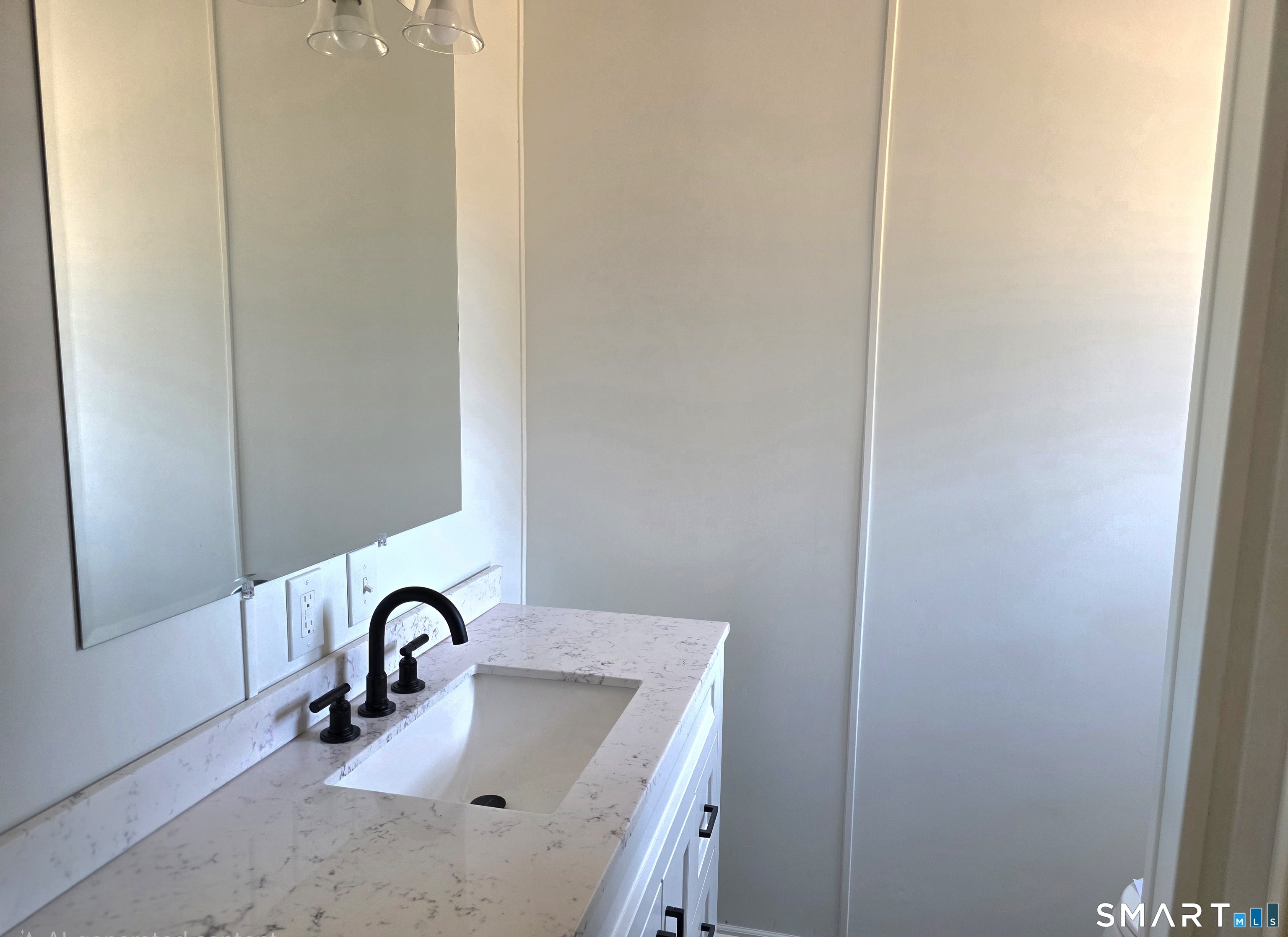 500 Washington Street, Unit 5 Middletown, CT 06457 - Photo 10 of 19 a bathroom with a sink and mirror